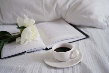 cup of coffee in the white bed