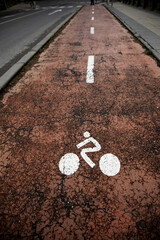 Bicycle sign on is asphalt