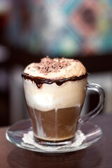 cup of cappuccino with chocolate