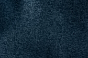Deep blue leather texture background. closeup view of big grain