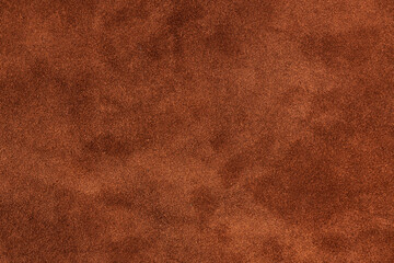 Old ginger leather texture background. closeup view of suede