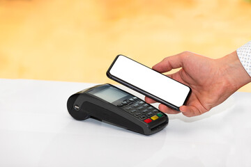mobile pay POS device nature background.