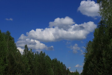 white clouds on a blue sky background