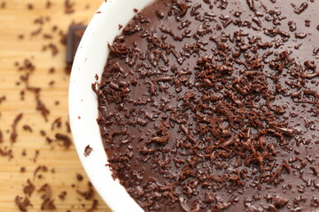 Delicious creamy chocolate pudding topped with chocolate chips 