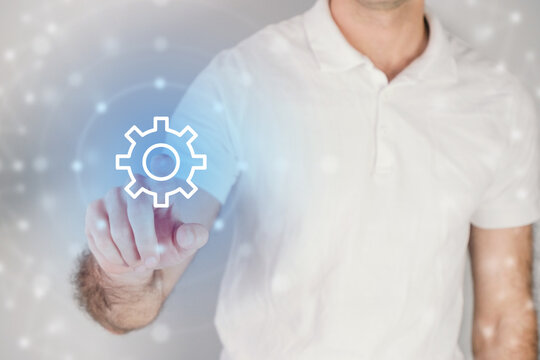 Setting concept, man presses  setting button