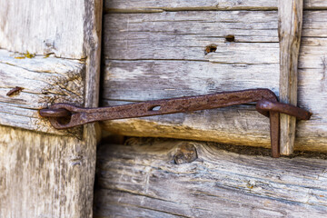 old wooden door with padlock