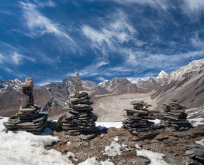 Stone chortens on Chukhung Ri in Sagarmatha National Park, Nepal Himalaya. Chukhung Ri is a rocky...