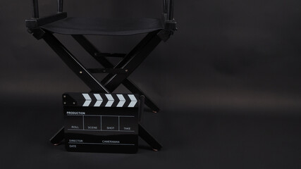 Director chair and black clapper board or movie slate use in video production, movie, film, cinema...