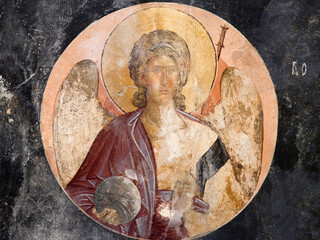 Portrait of Archangel Michael inside a medallion - ancient painted fresco of the Church of the Holy Saviour in Chora, Kariye Camii in Istanbul, Turkey.