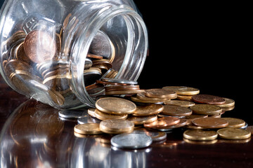 Brazilian money real coins in black background with selective focus