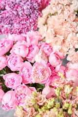 Fototapeta premium Floral carpet or Wallpaper. Background of mix of flowers. Beautiful flower for catalog or online store. Floral shop and delivery concept. Top view. Copy space