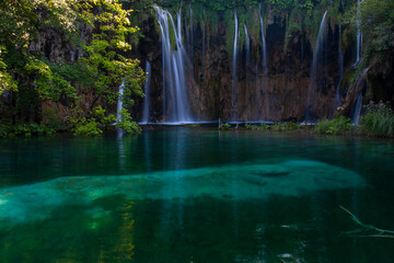 Fototapeta na wymiar waterfall in the forest, Plitvice lakes. Croatia