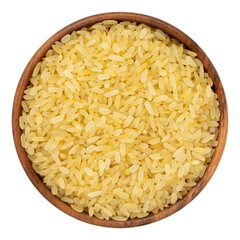 White rice in wooden bowl. Close up, top view