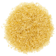 Top view of a heap of raw parboiled rice isolated on white background