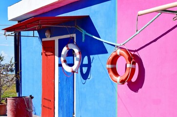 small colorful fisherman houses on the beach in the tourist resort of Vada in the municipality of Rosignano Marittimo in the province of Livorno in Tuscany, Italy
