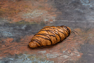 croissant with chocolate on a beautiful background