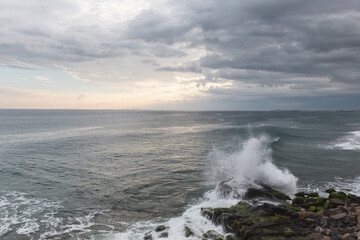 waves crashing on rocks