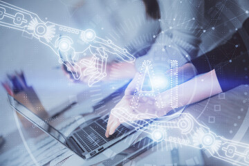 Double exposure of woman hands working on computer and data theme hologram drawing. Tech concept.