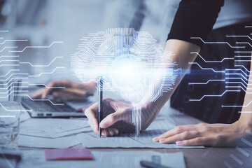 Multi exposure of woman hands working on computer and brain hologram drawing. Ai concept.
