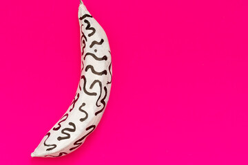 blue, white pink colored banana peels on pink, purple background, inclusion concept art