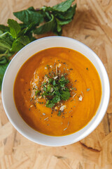 orange soup with greens
