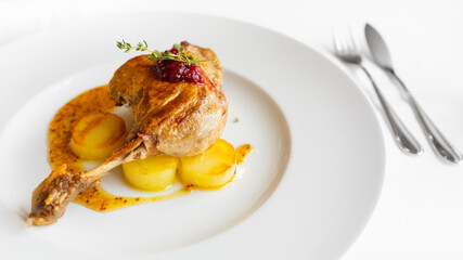 roasted duck leg with potato and mustard sauce