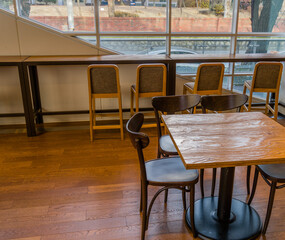 Brightly lit study area with large windows