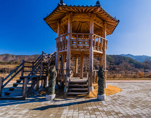 Two story wooden gazebo in a public park