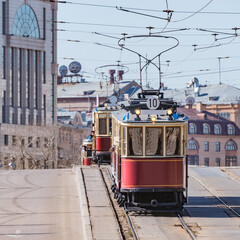 Fototapeta na wymiar Old vintage tramway cars on the empty city street.