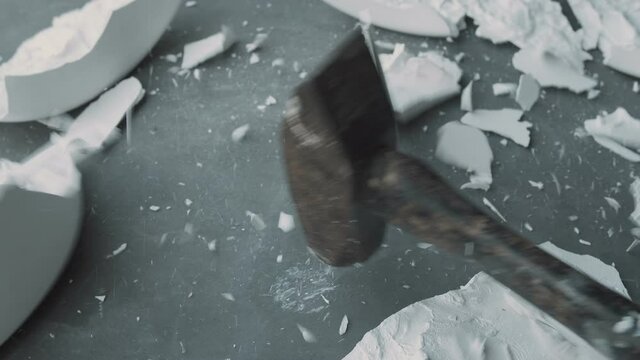 hammering rocks broken plaster