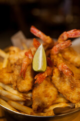 fried shrimp with sauce and lemon slice