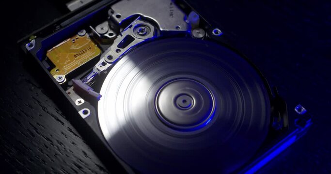 Stopping Hard Drive, small Hard Disk with scratches stopping. Closeup storage
