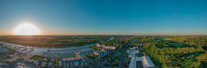 Panoramic sunset drone landscapes over the small yacht port in Luenen in Germany