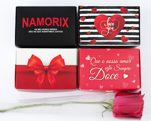 Naklejka na ściany i meble Rio de Janeiro, Brasil - 06 June 2020: Gift boxes for valentine's day with rose - Caixas de presente dia dos namorados com rosa
