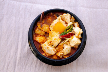 Korean spicy silken tofu stew with seafood