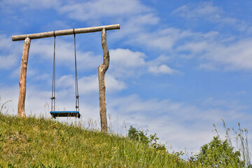 Fototapeta na wymiar ordinary wooden swing