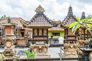 Obraz premium Streets of Desa Katung in Kintamani, Bangli, Bali, Indonesia. Traditional Balinese houses with family altars.