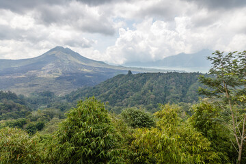 Fototapeta na wymiar View of volcano Batur (Gunung Batur) and Lake Batur (Danau Batur). Kintamani, Bangli, Bali, Indonesia.