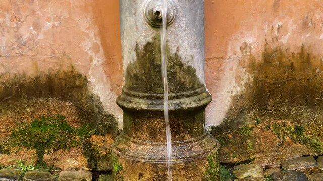 a typical public drinking fountain located on the streets of the historic center of Rome. Typical Nasone (Literally meaning "large nose"). Free drinking water.