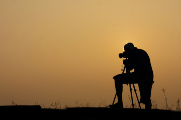 Silhouette photographer With the morning atmosphere