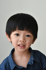 portrait image of happy asian boy smile face on white background