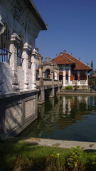 Fototapeta na wymiar Sunny view of Ujung Water Palace in Bali , Indonesia.