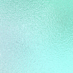 Mint green foil paper texture background.