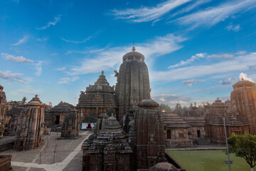 Lingaraja Hindu Temple complex. Ornately carved buildings inside a walled compound. Bhubaneswar, Odisha, India. 11th Century AD