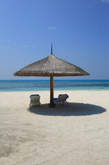 Fototapeta na wymiar beach with umbrella at Maldives Island