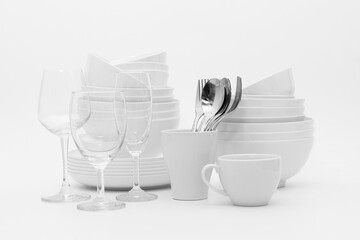 set clean dishes glasses on white