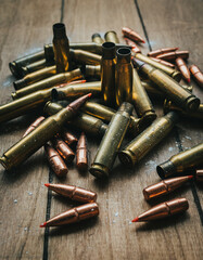 .308 Ammunition with projectiles Flat Lay on board surrounded by powder