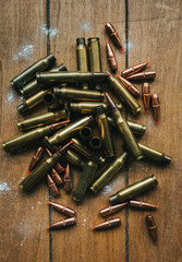 .308 Ammunition with projectiles Flat Lay on board surrounded by powder
