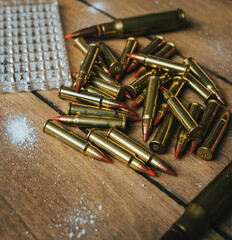 17HMR and .308 Ammunition on board surrounded by powder