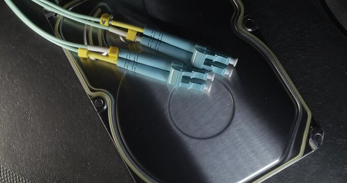 Panning over Hard Drive enclosure and Fiber connection cable